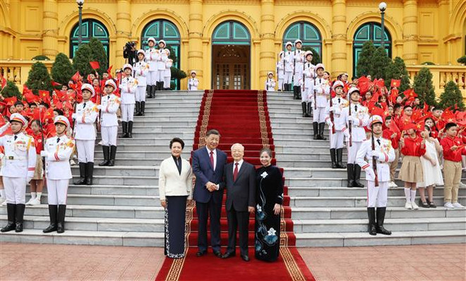 Cérémonie d'accueil officielle du secrétaire général et président chinois Xi Jinping ảnh 1 Cérémonie d'accueil officielle du secrétaire général et président chinois Xi Jinping ảnh 1