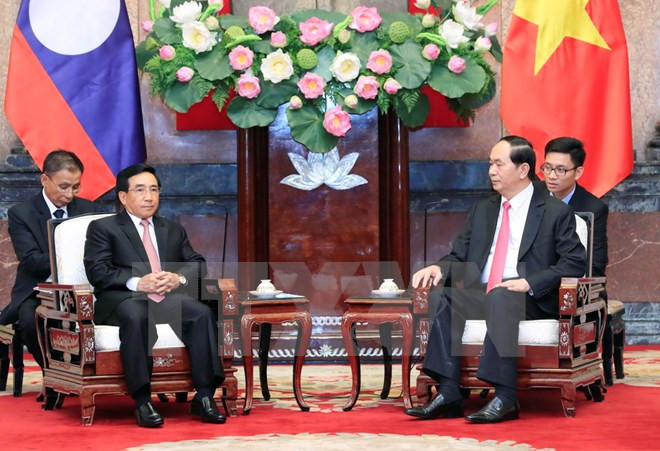 Les dirigeants vietnamiens reçoivent le vice-président laotien Phankham Viphavanh ảnh 2 Les dirigeants vietnamiens reçoivent le vice-président laotien Phankham Viphavanh ảnh 2