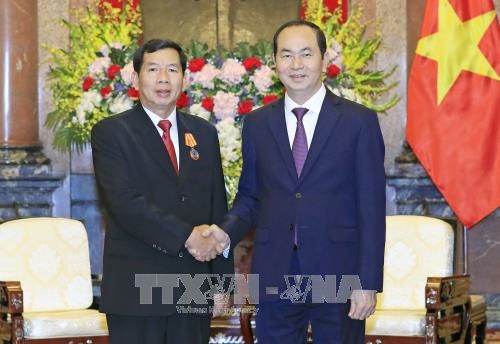 Le président vietnamien reçoit le président de la Cour populaire suprême du Laos ảnh 1 Le président vietnamien reçoit le président de la Cour populaire suprême du Laos ảnh 1
