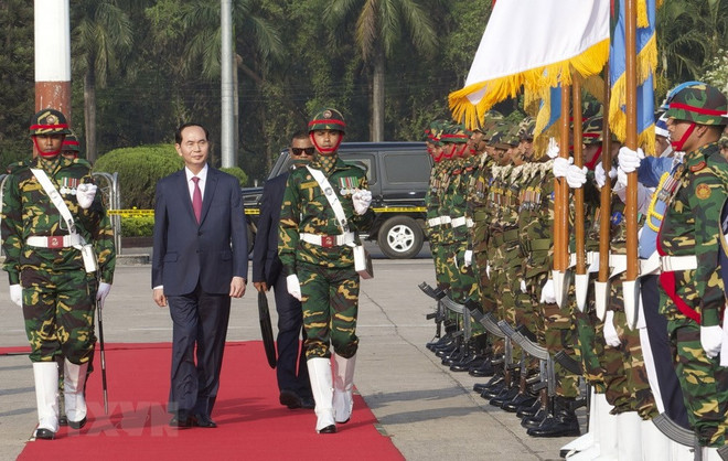 Le président Trân Dai Quang arrive à Dacca pour sa visite d’Etat au Bangladesh ảnh 2 Le président Trân Dai Quang arrive à Dacca pour sa visite d’Etat au Bangladesh ảnh 2