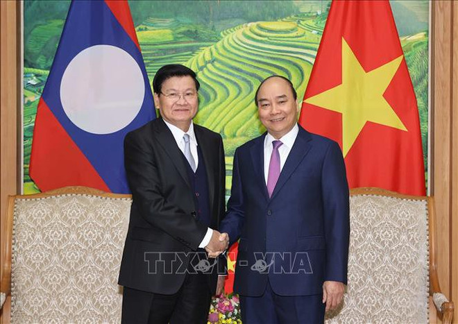 Le Premier ministre lao termine sa visite au Vietnam ảnh 1 Le Premier ministre lao termine sa visite au Vietnam ảnh 1