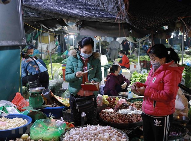Au 2e jour de l’année lunaire, plusieurs supermarchés et marchés ouvrent déjà leurs portes ảnh 1