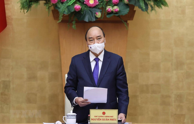 COVID-19 : s'efforcer d'avoir des doses de vaccins en février, selon le PM ảnh 1 COVID-19 : s'efforcer d'avoir des doses de vaccins en février, selon le PM ảnh 1