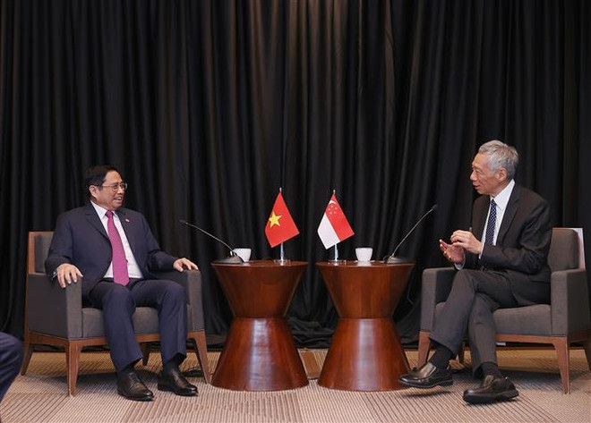 Le PM Pham Minh Chinh rencontre son homologue singapourien aux Etats-Unis ảnh 1 Le PM Pham Minh Chinh rencontre son homologue singapourien aux Etats-Unis ảnh 1