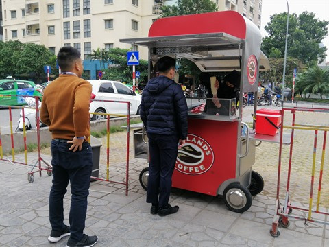COVID-19 : Les chaînes de café au Vietnam développent la vente à emporter ảnh 1 COVID-19 : Les chaînes de café au Vietnam développent la vente à emporter ảnh 1