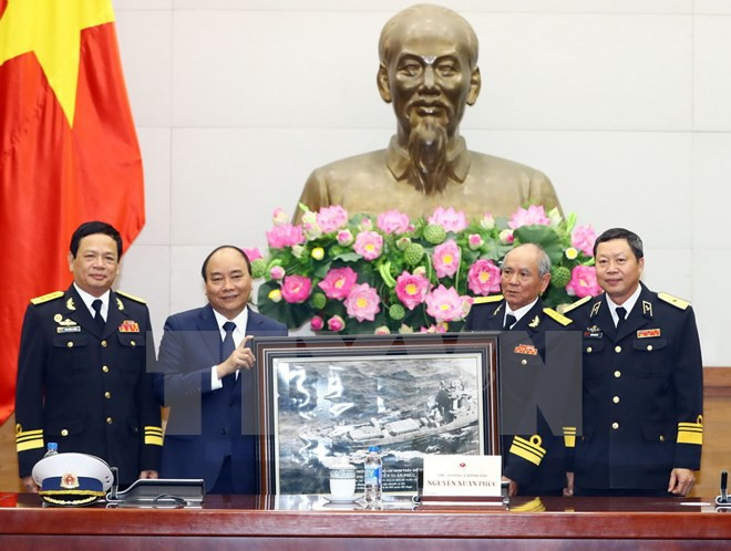 Le PM Nguyên Xuân Phuc rencontre des anciens combattants de la piste Hô Chi Minh en mer ảnh 1 Le PM Nguyên Xuân Phuc rencontre des anciens combattants de la piste Hô Chi Minh en mer ảnh 1