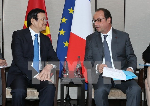 Le président Truong Tan Sang rencontre son homologue français François Hollande ảnh 1 Le président Truong Tan Sang rencontre son homologue français François Hollande ảnh 1