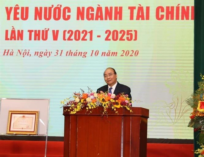 Le PM au 5e Congrès d’émulation patriotique du secteur financier ảnh 1