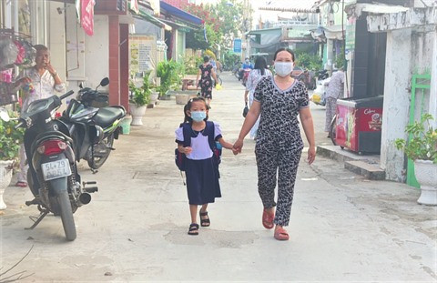 COVID-19 : retour à l'école des élèves d'une commune insulaire à Hô Chi Minh-Ville ảnh 2