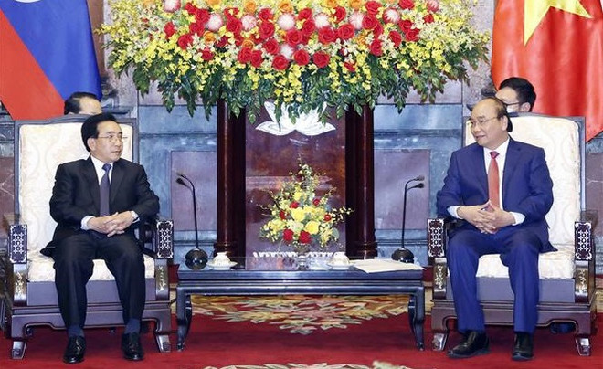 Le président Nguyen Xuan Phuc reçoit le Premier ministre lao ảnh 1 Le président Nguyen Xuan Phuc reçoit le Premier ministre lao ảnh 1