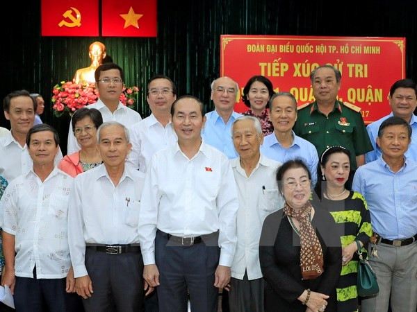 Le président Tran Dai Quang rencontre des électeurs de Ho Chi Minh-Ville ảnh 1
