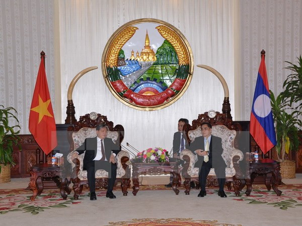 Le ministre vietnamien de la Justice reçu par le PM laotien ảnh 1 Le ministre vietnamien de la Justice reçu par le PM laotien ảnh 1