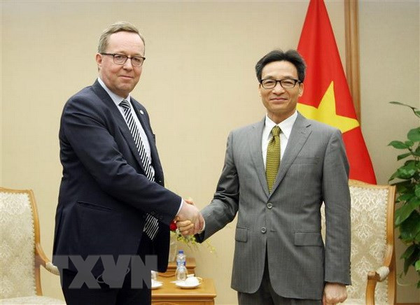 Le vice-PM Vu Duc Dam reçoit le ministre finlandais de l’Economie ảnh 1 Le vice-PM Vu Duc Dam reçoit le ministre finlandais de l’Economie ảnh 1