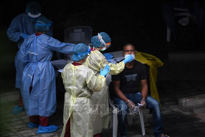 Des mesures de lutte contre le COVID-19 à Singapour et en Malaisie ảnh 1 Des mesures de lutte contre le COVID-19 à Singapour et en Malaisie ảnh 1