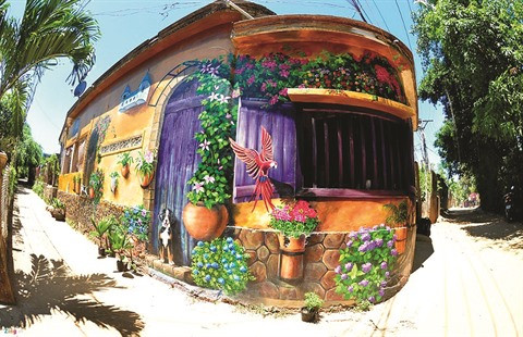 Quang Ninh a son "village des fresques" ảnh 1