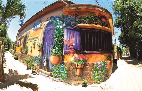 Quang Ninh a son "village des fresques" ảnh 1