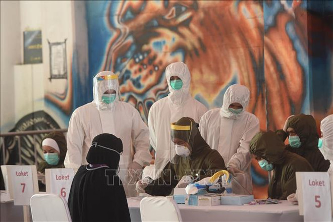 COVID-19 : baisse du nombre de cas d’infection dans certains pays d’Asie du Sud-Est ảnh 1 COVID-19 : baisse du nombre de cas d’infection dans certains pays d’Asie du Sud-Est ảnh 1