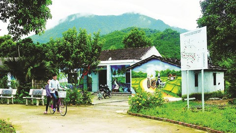 Quang Ninh a son "village des fresques" ảnh 2