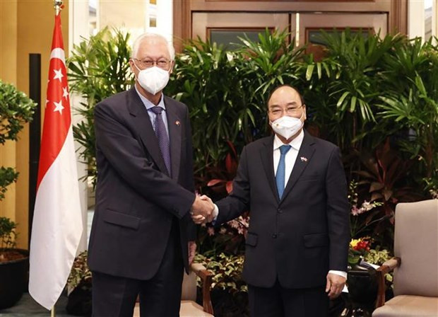 Le président Nguyen Xuan Phuc rencontre des personnalités singapouriennes ảnh 1 Le président Nguyen Xuan Phuc rencontre des personnalités singapouriennes ảnh 1