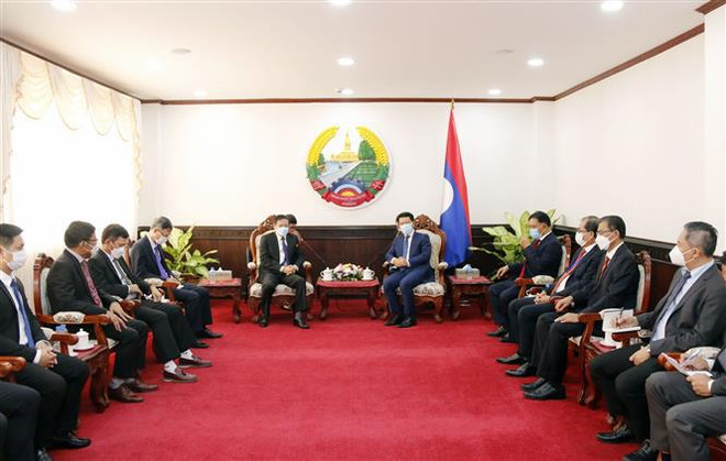 Fête nationale du Laos: Félicitations de l’ambassadeur du Vietnam ảnh 1 Fête nationale du Laos: Félicitations de l’ambassadeur du Vietnam ảnh 1