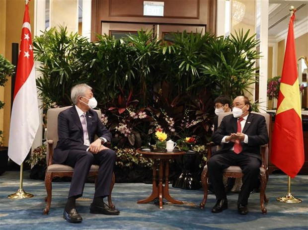 Le président Nguyen Xuan Phuc rencontre des personnalités singapouriennes ảnh 2 Le président Nguyen Xuan Phuc rencontre des personnalités singapouriennes ảnh 2