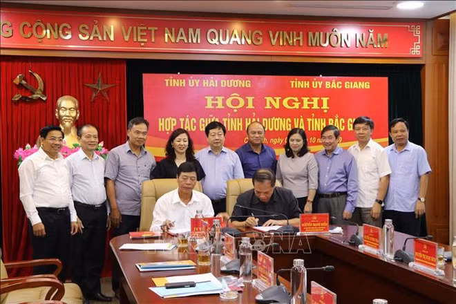 Renforcement de la coopération entre Hai Duong et Bac Giang ảnh 1
