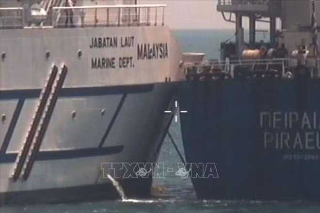 Singapour demande à la Malaisie de rappeler ses navires des eaux litigieuses ảnh 1