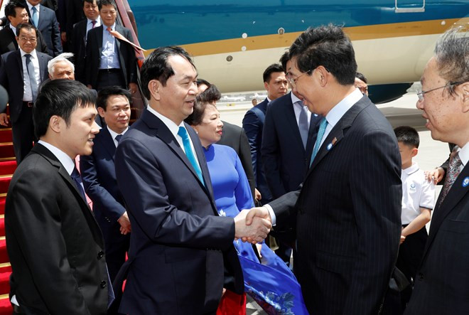 Le président Tran Dai Quang et son épouse entament une visite d'Etat en Chine ảnh 1 Le président Tran Dai Quang et son épouse entament une visite d'Etat en Chine ảnh 1