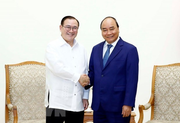 Le PM vietnamien reçoit le ministre philippin des Affaires étrangères ảnh 1 Le PM vietnamien reçoit le ministre philippin des Affaires étrangères ảnh 1