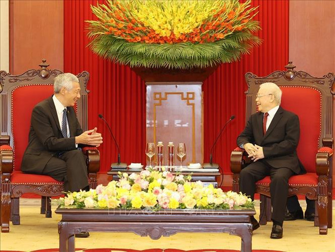 Le leader du PCV reçoit le Premier ministre singapourien ảnh 1 Le leader du PCV reçoit le Premier ministre singapourien ảnh 1