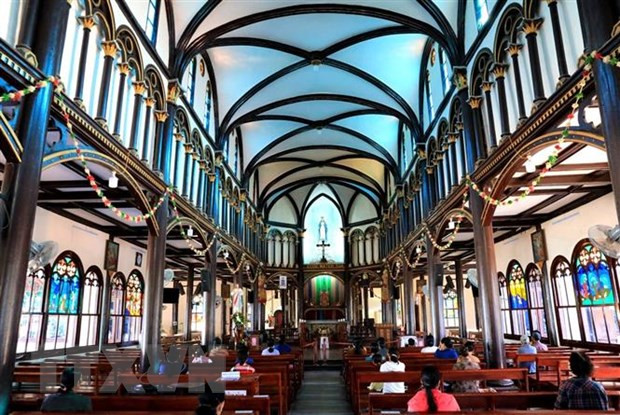 A la découverte d'une cathédrale centenaire en bois à Kon Tum ảnh 3 A la découverte d'une cathédrale centenaire en bois à Kon Tum ảnh 3