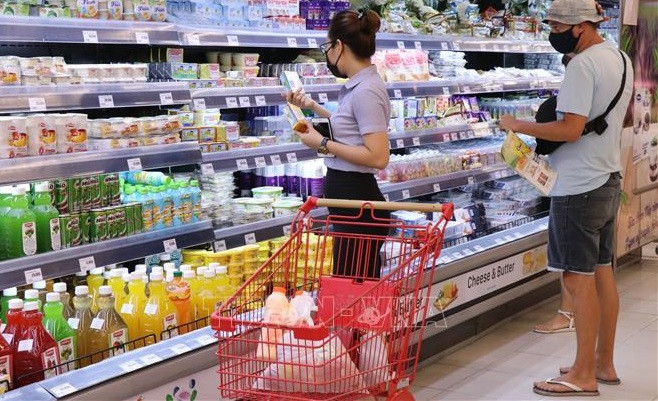 Les consommateurs vietnamiens privilégient les produits nationaux ảnh 1