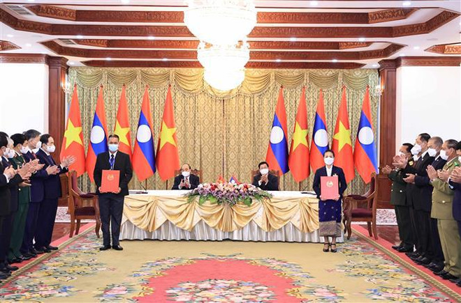 Le président vietnamien s’entretient avec son homologue lao à Vientiane ảnh 2 Le président vietnamien s’entretient avec son homologue lao à Vientiane ảnh 2