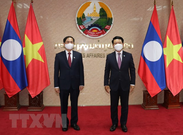 Le ministre des Affaires étrangères travaille avec son homologue lao ảnh 1 Le ministre des Affaires étrangères travaille avec son homologue lao ảnh 1