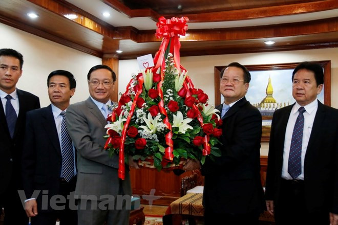 Le Vietnam félicite le Parti populaire révolutionnaire du Laos pour son 63e anniversaire ảnh 1 Le Vietnam félicite le Parti populaire révolutionnaire du Laos pour son 63e anniversaire ảnh 1