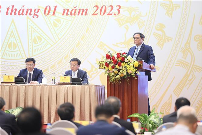 Le PM Pham Minh Chinh à la conférence-bilan de 2022 du secteur des Transports ảnh 1