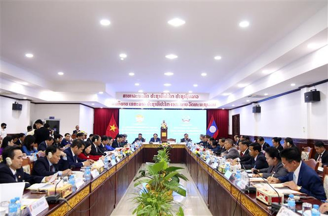 Conférence internationale sur la construction d'une frontière Laos-Vietnam de paix et d'amitié ảnh 1