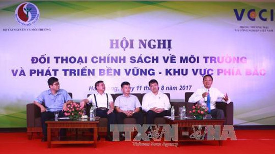 Dialogue sur les politiques liées à l’environnement et au développement durable ảnh 1