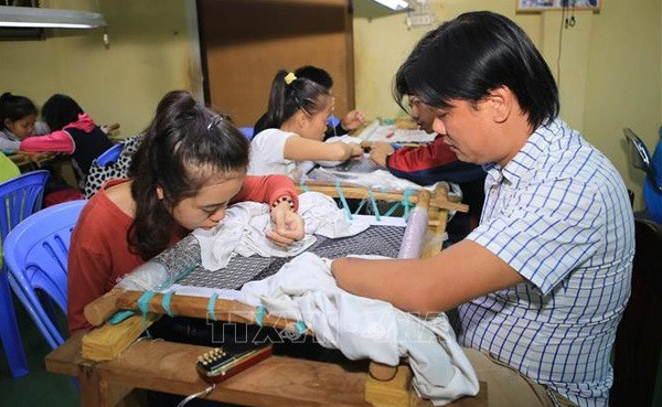 Les Vietnamiens handicapés jouissent de droits égaux et complets ảnh 1 Les Vietnamiens handicapés jouissent de droits égaux et complets ảnh 1