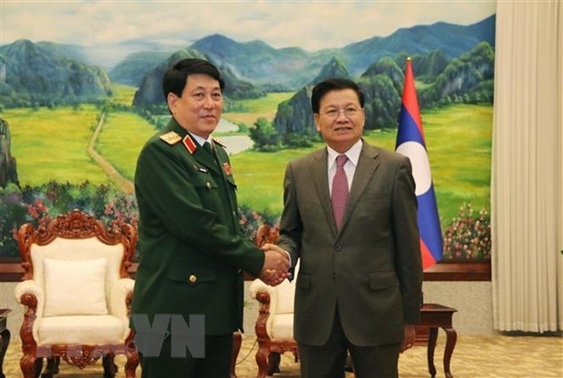 Visite d'une délégation militaire vietnamienne de haut rang au Laos ảnh 1 Visite d'une délégation militaire vietnamienne de haut rang au Laos ảnh 1