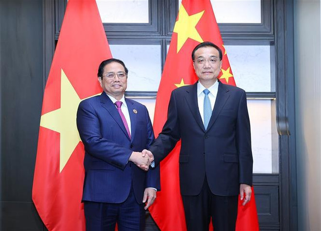 Rencontre entre les Premiers ministres vietnamien et chinois à Phnom Penh ảnh 1 Rencontre entre les Premiers ministres vietnamien et chinois à Phnom Penh ảnh 1