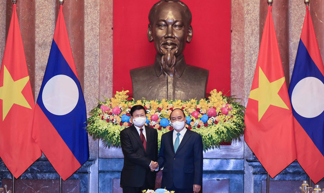 Entrevue entre le président vietnamien et le SG du Parti et président lao ảnh 1 Entrevue entre le président vietnamien et le SG du Parti et président lao ảnh 1