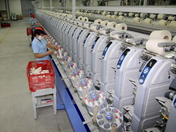 Le ministre Vu Huy Hoang rencontre des entreprises vietnamiennes à Singapour ảnh 1