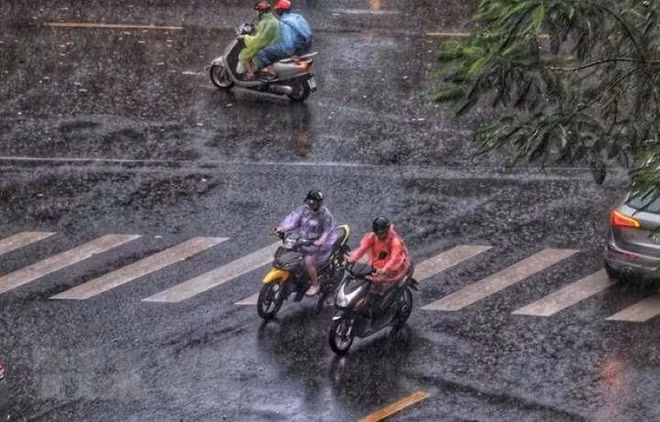 Temps froid accompagné de pluie dans le Nord ảnh 2