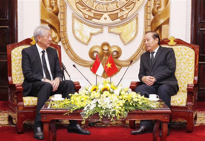 Le vice-PM Truong Hoa Binh reçoit son homologue singapourien Teo Chee Hean ảnh 1 Le vice-PM Truong Hoa Binh reçoit son homologue singapourien Teo Chee Hean ảnh 1