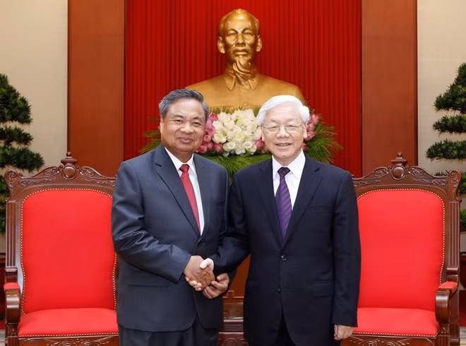 Le secrétaire général du PCV reçoit une délégation du PPRL ảnh 1