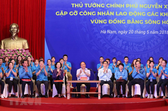 Le PM dialogue avec un millier d'ouvriers du delta du fleuve Rouge ảnh 1 Le PM dialogue avec un millier d'ouvriers du delta du fleuve Rouge ảnh 1