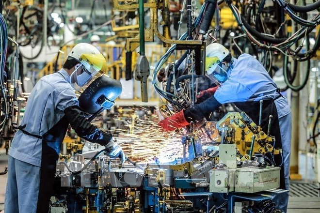 Le COVID-19 fait reculer l’indice du PMI du Vietnam en mars ảnh 1