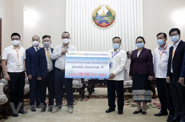 Coronavirus: des entreprises vietnamiennes aux côtés du gouvernement et du peuple du Laos ảnh 1 Coronavirus: des entreprises vietnamiennes aux côtés du gouvernement et du peuple du Laos ảnh 1