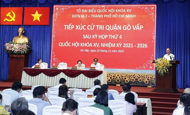 Le président rencontre les électeurs de Ho Chi Minh-Ville ảnh 1